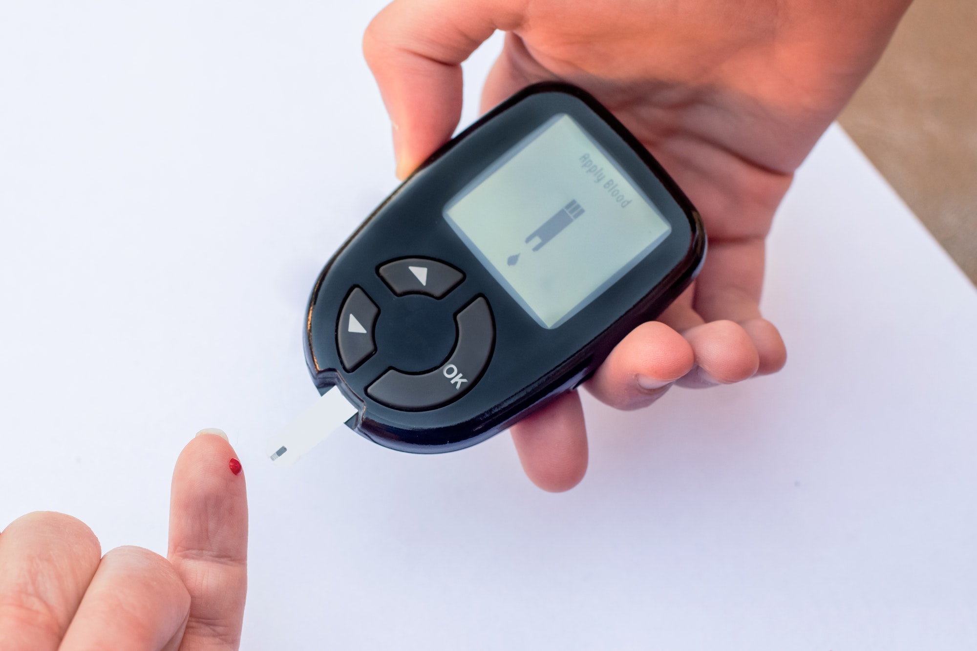 Blood sugar test with glucose meter. Diabetes